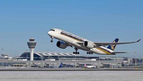 Singapore Airlines expands its presence in Munich Singapore Airlines and Lufthansa aircraft on the tarmac of an international airport with terminal building and control